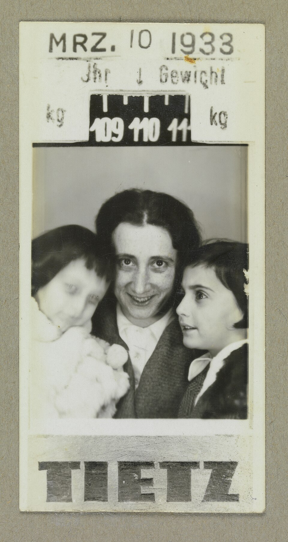 Edith Frank photographed with her daughters Margot and Anne in a photo booth, Frankfurt, 1933