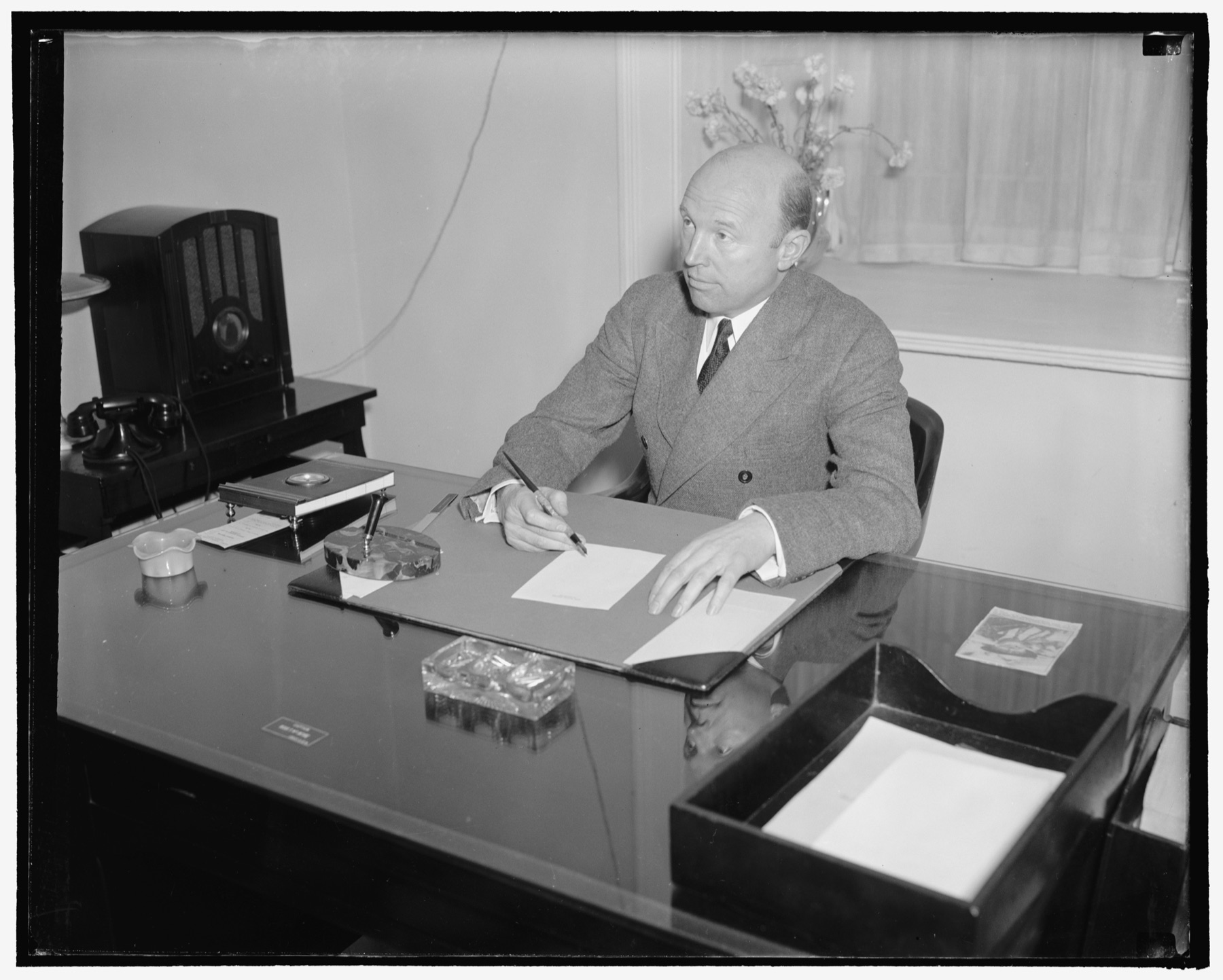 Rear Admiral Ross T. McIntire, Surgeon General of the United States Navy and the President's physician.