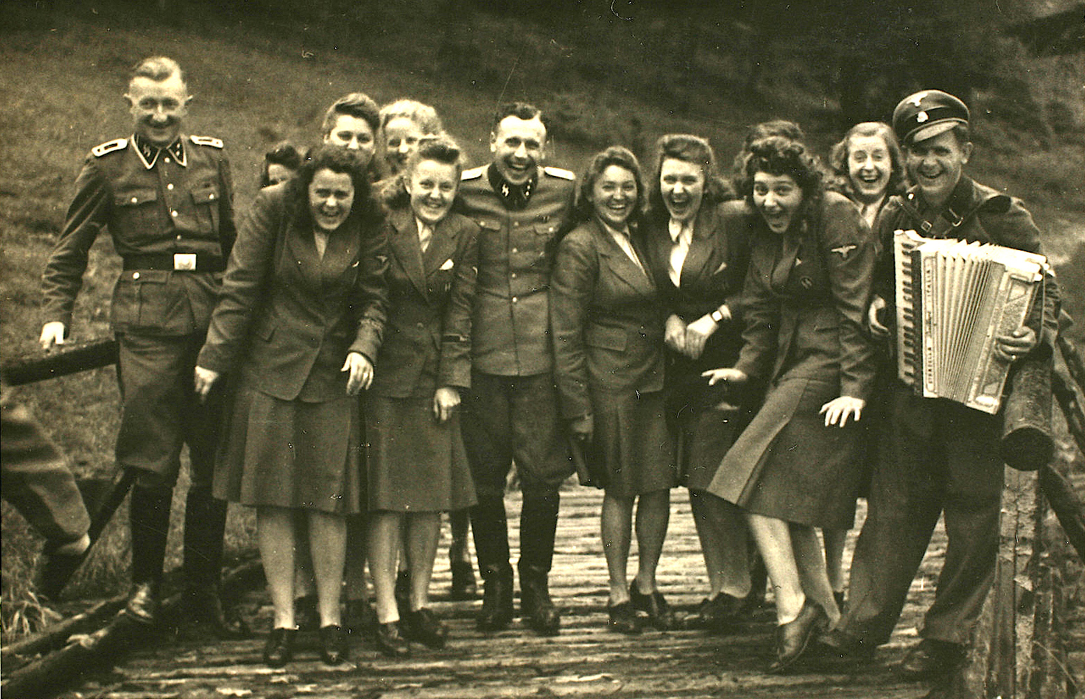 SS officers and auxiliaries relaxing at a country retreat, July 1944