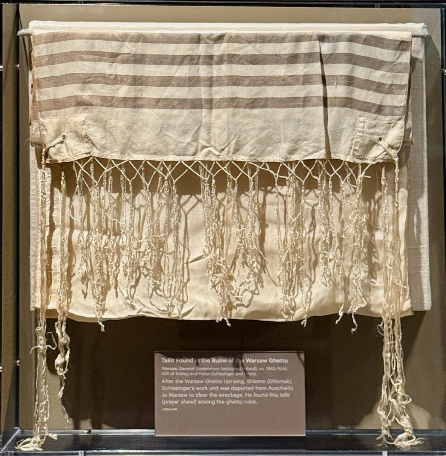 A tallit prayer shawl recovered from the ruins of the Warsaw Ghetto